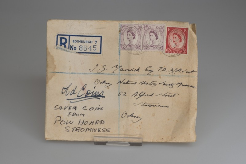 Envelope which contained four copper turners from the reign of Charles I