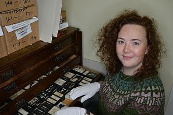 Holly Young examining the Robert Rendall shell collection