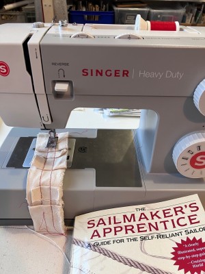 Sailmaking with a sewing machine and the help of an instruction book