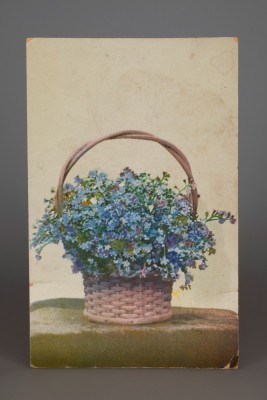 Postcard depicting a basket of flowers