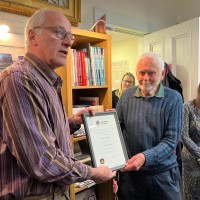 Bryce Wilson receiving his Curator Emeritus title from Museum Chair Ian Johnstone (Credit Rebecca Marr)